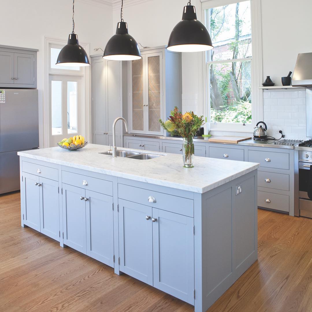 This kitchen was a true combined effort. Our client knew exactly the look she wanted to achieve and knew we could deliver. Working together we designed this Hampton style kitchen with face fame cabinets, exposed hinges and shaker style doors. The extended vertical face frame to the floor gives the appearance of free standing furniture. Woven mesh to some of the cabinets also adds a traditional element.  .
.
.
.
.